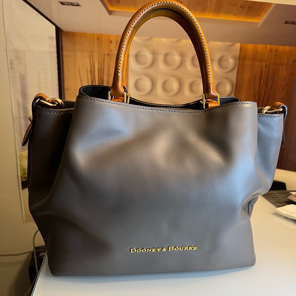 Dooney and Bourke Large City Barlow.            Color: Taupe